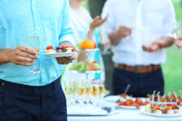 Guests drink champagne on wedding ceremony © Africa Studio