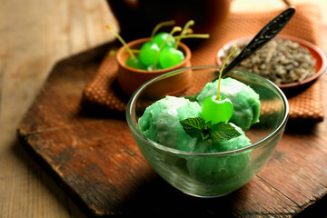 Homemade Green tea ice-cream on dark wooden background