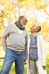 Senior happy couple looking each other