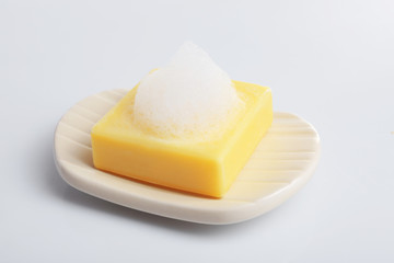 Soap with foam isolated on white