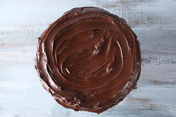 tasty chocolate cake on light background
