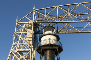 Duluth Inner Canal Lighthouse / A lighthouse next to a lift bridge.