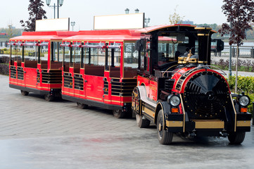 Fototapeta na wymiar Miniature steam train at an amusement park