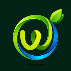 W letter with green leaves and water waves.