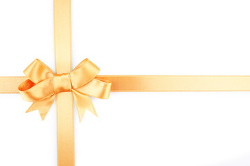 Satin peach ribbon bow isolated on white