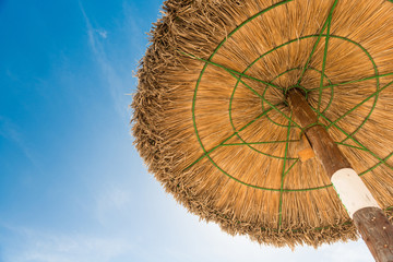 Under the beach umbrella