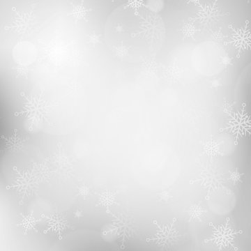 Christmas silver blurred background with snowflakes