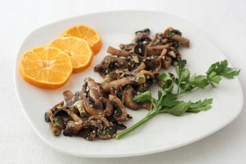 Mushroom dish cooked with a little parsley and orange.