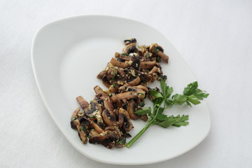 Mushroom dish cooked with a little parsley and orange.