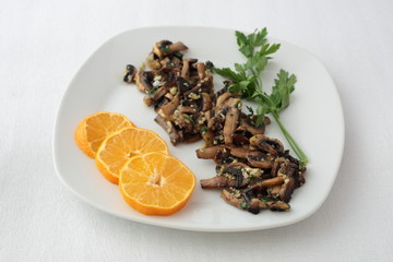 Mushroom dish cooked with a little parsley and orange.