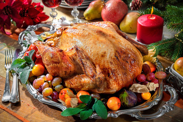 Roasted turkey on holiday table