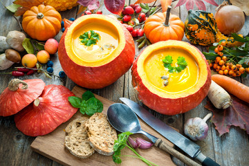 Pumpkin soup on a wooden table