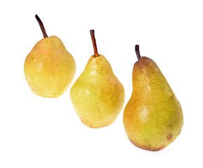 Three  ripe yellow pear isolated on white background