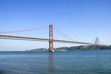 Fototapeta na wymiar bridge of 25th April over river Tajo, Portugal