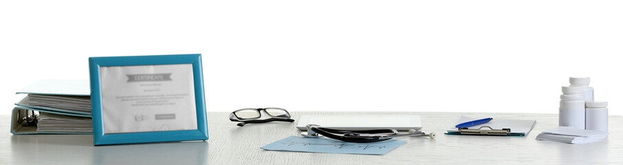 Doctor table with tools on white background