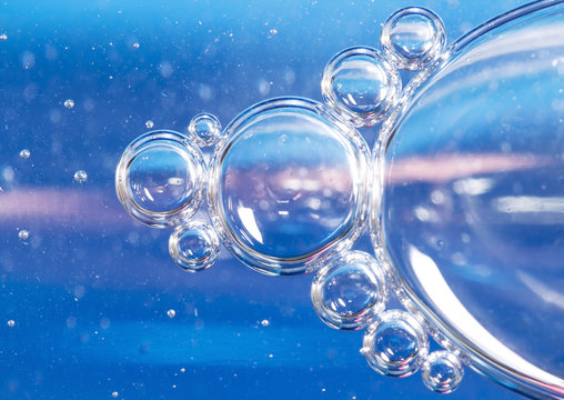 Blue bubbles in clear water.