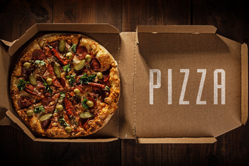 pizza in the in delivery box - Powered by Adobe