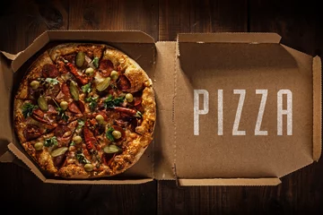 Foto op Plexiglas pizza in the in delivery box © artemiykas