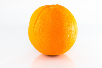 Ripe orange isolated on white background.