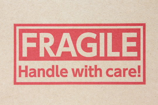 Fragile symbol on brown paper box