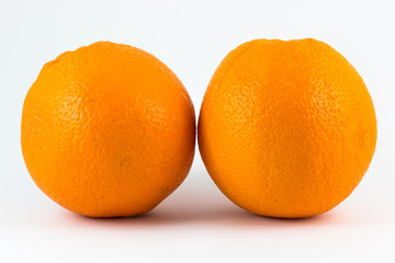 Two oranges isolated on white background