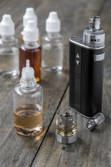 Obraz na płótnie Canvas e-cigarettes with different re-fill bottles