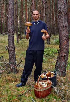 Young man and found mushroom