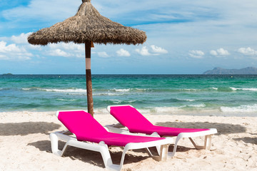 Two beach beds under a sunshade at the Mediterranean Sea - 8567