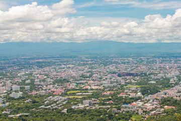 Fototapeta na wymiar Top view of Chiang Mai town from viewpoint near Wat Phra That Doi Suthep, Chiang Mai province, Thailand