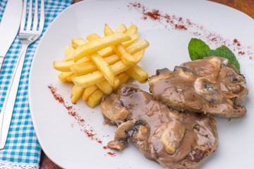 filet migñon champiñones