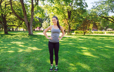 happy young woman exercising outdoors