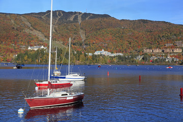 Mont Tremblant lake and village with autumn colors, Quebec, Canada