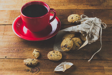 cup of coffee and oatmeal cookies. background. toning