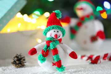 Cute snowmen on Christmas background