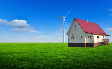 beautiful view of the residential house on spring meadow