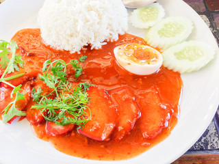 Barbecued red pork in sauce with rice