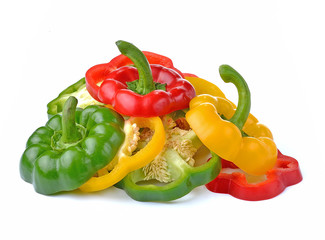 red, green and yellow sliced pepper isolated on white background
