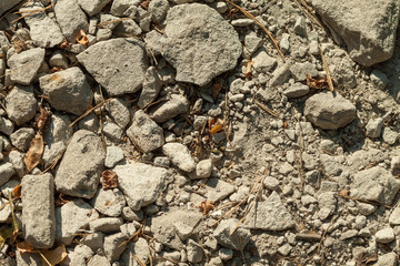 Crushed fragments of concrete on the ground
