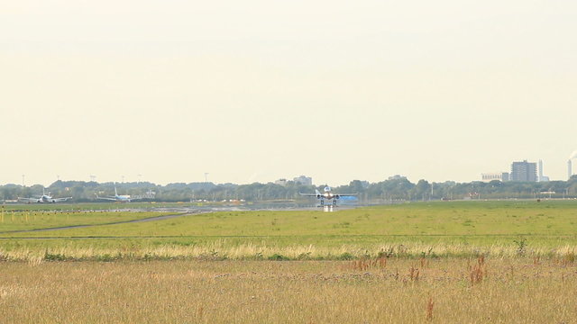 Large jet airplane taking off from Schiphol Airport