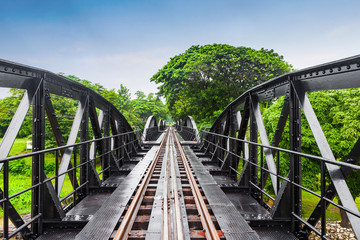 Fototapeta na wymiar Railway metal bridge of world war history, River Kwai, Thailand