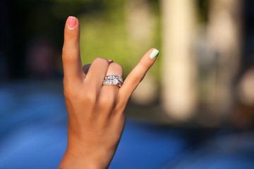 Diamond rings on woman finger.