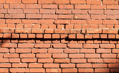 old red brick wall background. brick wall texture. grunge wallpaper. 