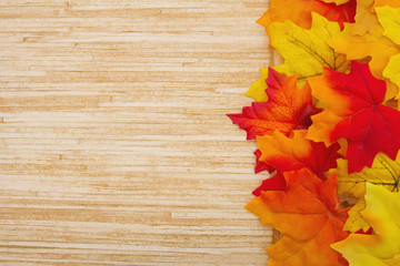 Autumn Leaves and Weather Wood Background