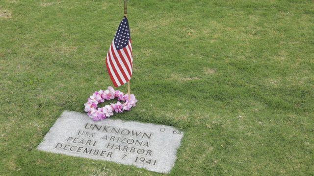 Slow panning clip in Punchbowl National Cemetary of a gravesite of an unidentified person who died aboard the USS Arizona during the attack on Pearl Harbor on December 7, 1941.