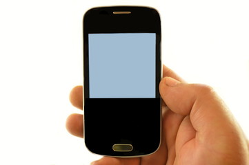Hand holding a cell phone.