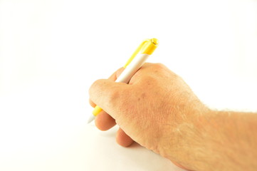 Pencil in hand isolated on a white background.