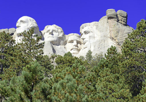 Mount Rushmore National Memorial, symbol of America located in the Black Hills, South Dakota, USA. Image with blue space for added text or for presentations.