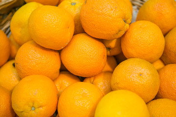 Many fresh raw oranges
