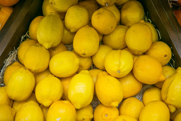 Colorful lemons in market