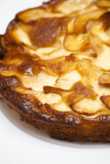 Apple pie on a white plate